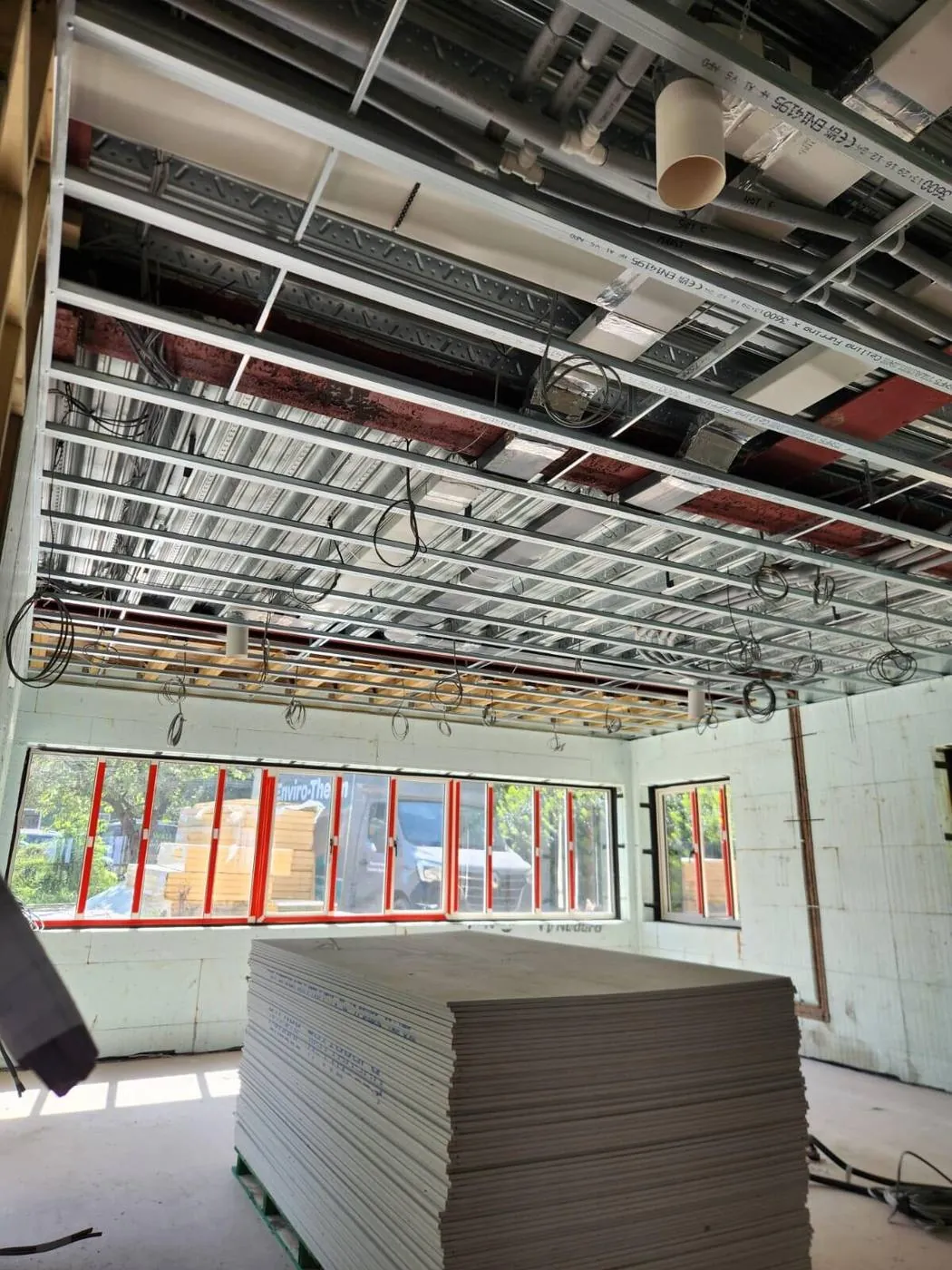 MF suspended ceiling grid installed to a commercial unit, Cambridge