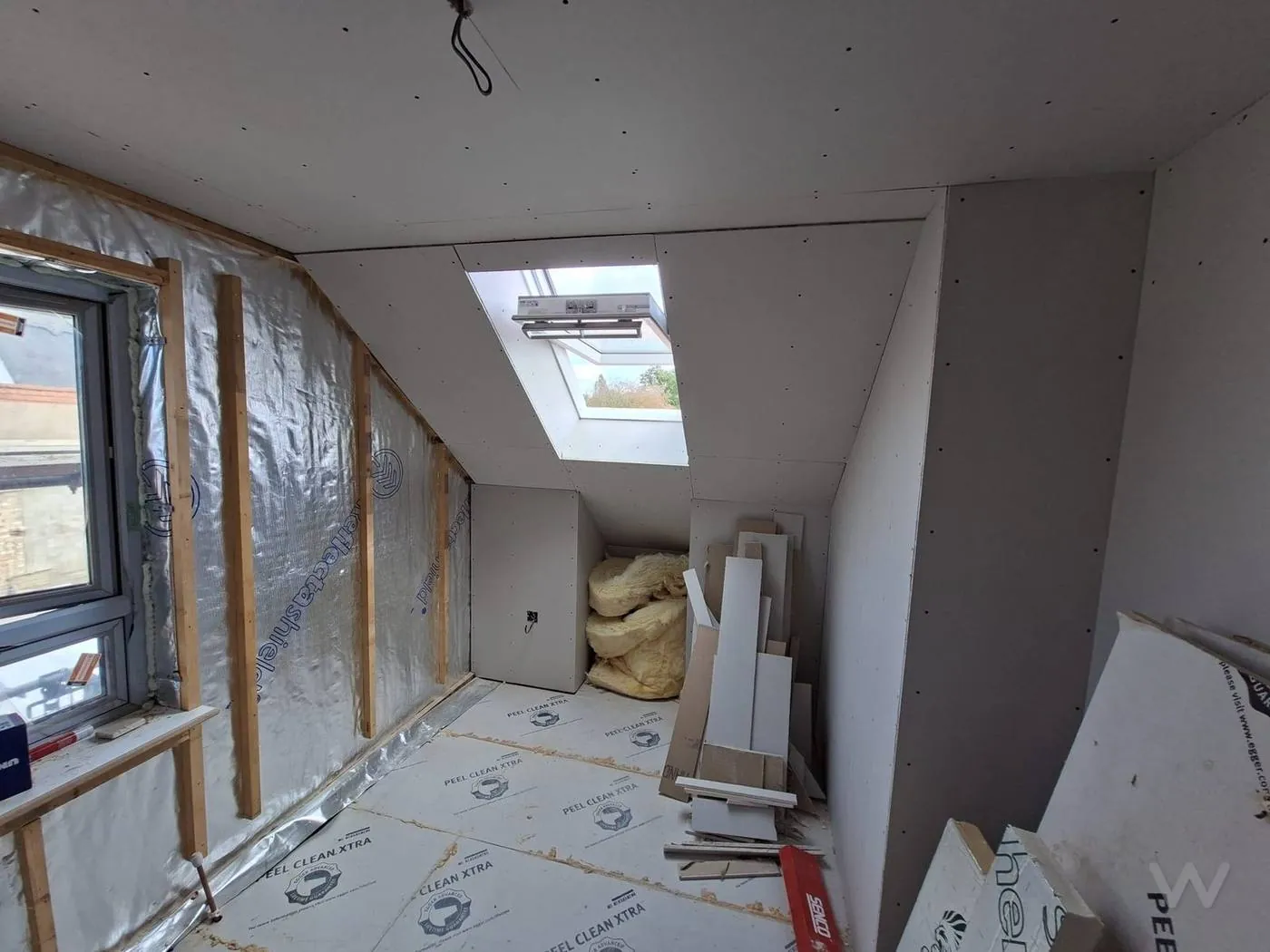 Insulated and membrane-lined loft room before boarding, Elmswell