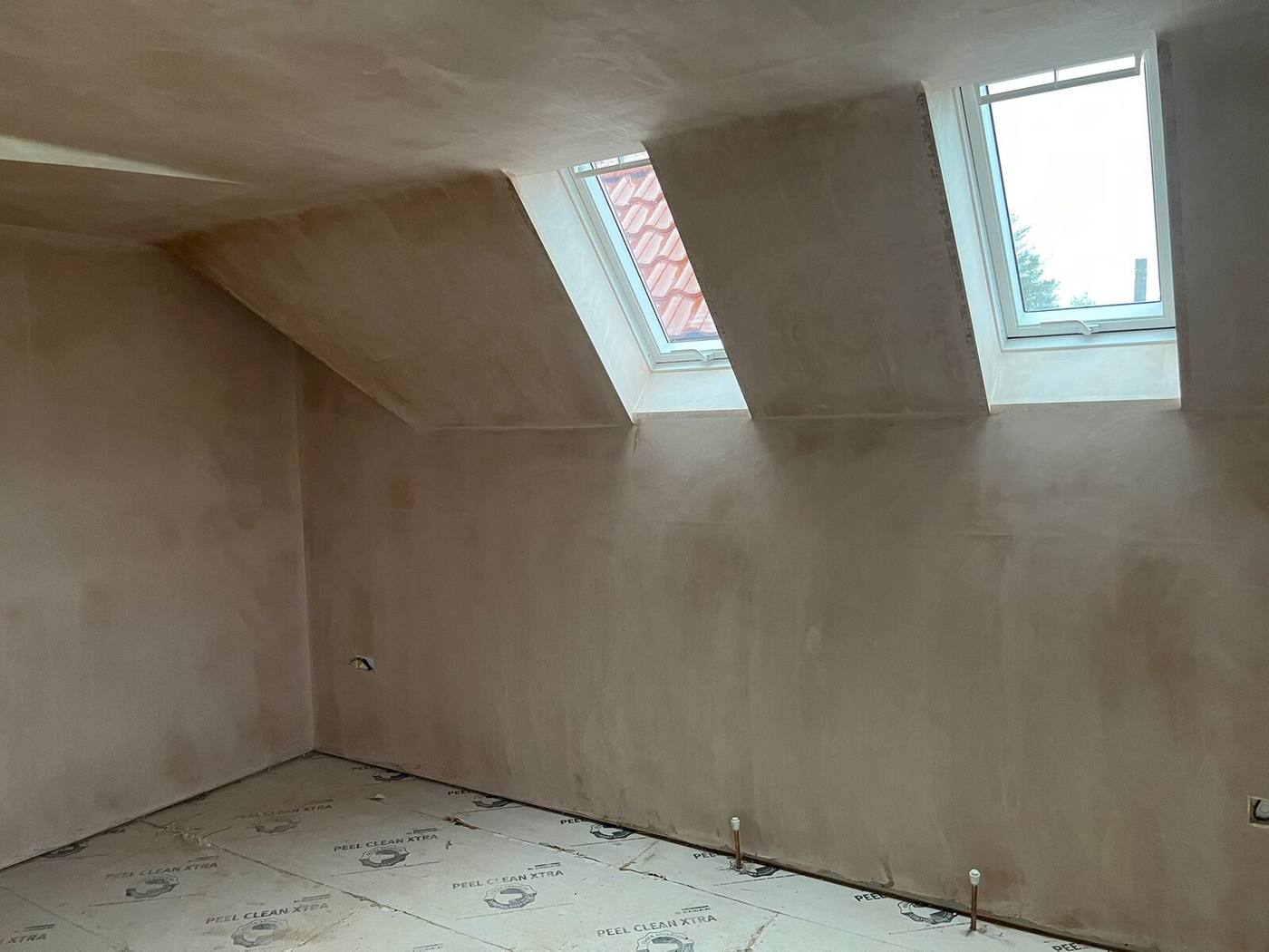 Skim finish to a vaulted loft room, Elmswell