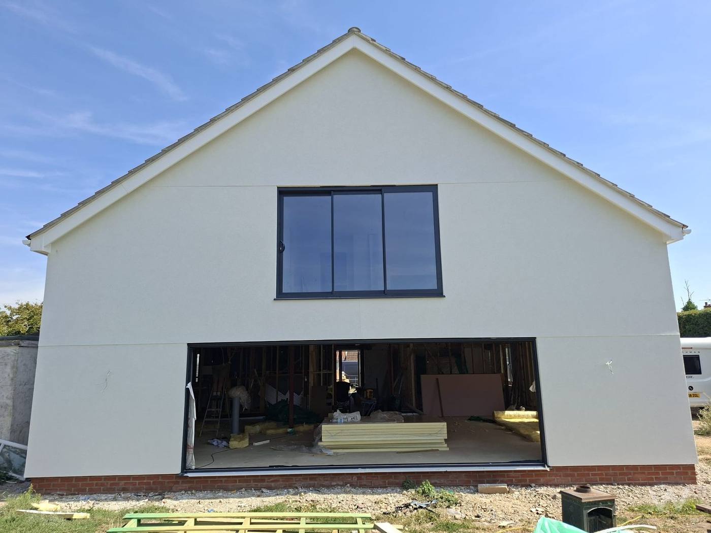 Consistent machine-applied render finish, Kenton