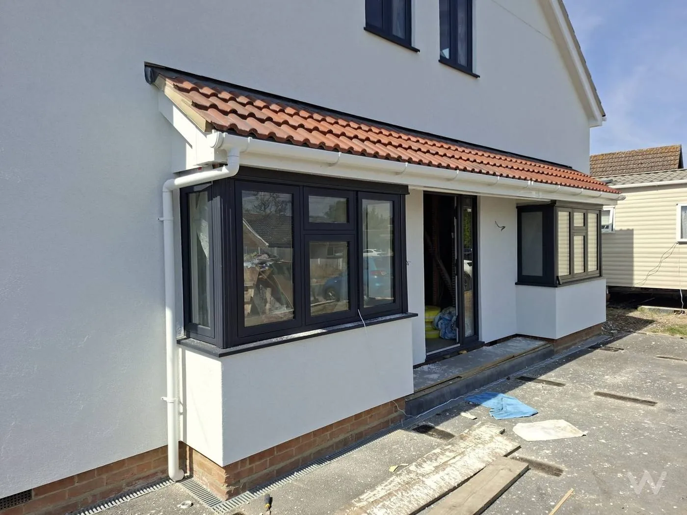Render detail around bay windows, Kenton