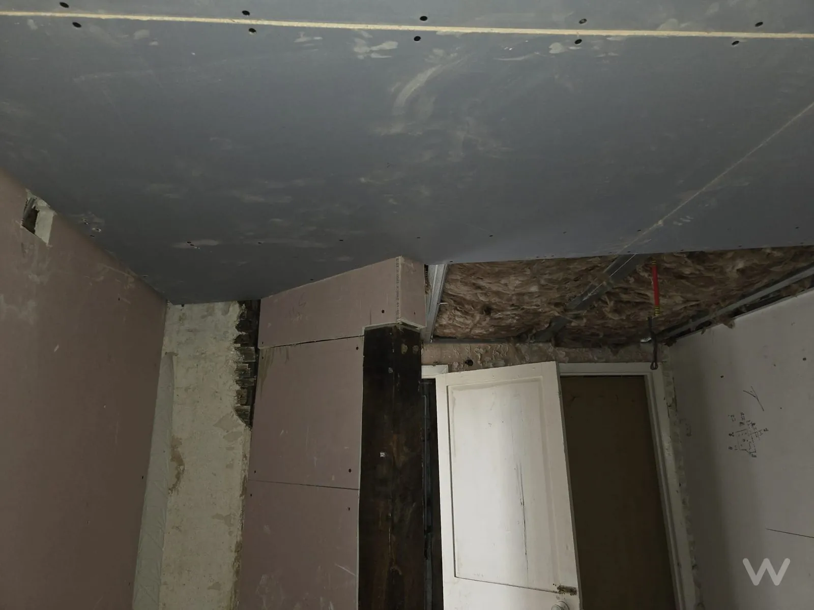 Plasterboarding complete with bulkhead formed, ready for skim