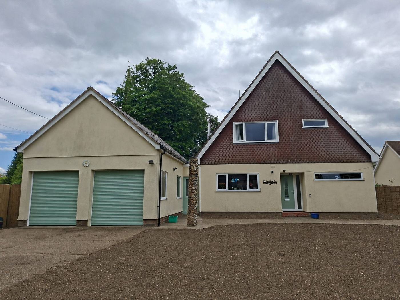 Weathered render before works, Woolpit